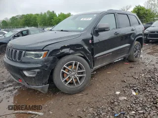 2017 Jeep Grand Cherokee Trailhawk with VIN 1C4RJFLG0HC625122, listed as a Copart auction lot 55218615 with 103,180 mi miles and Salvage title. Bid and sale history available at DreamBid. Image 1.