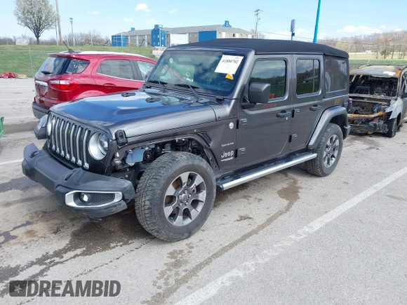 2019 Jeep Wrangler Unlimited Sahara with VIN 1C4HJXEN3KW622167, listed as a IAAI auction lot 41880702 with 72,928 mi miles and . Bid and sale history available at DreamBid. Image 2.