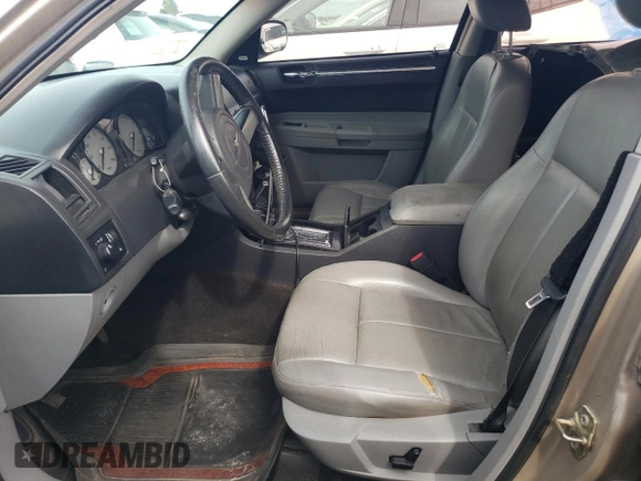 2006 Chrysler 300 Touring with VIN 2C3KA53G26H225251, listed as a Copart auction lot 70806354 with 216,259 mi miles and Salvage Title. Bid and sale history available at carsss.com. Image 7.