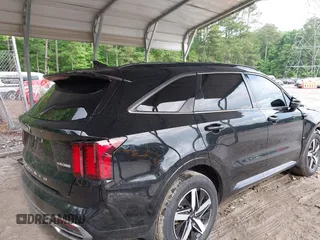 2021 Kia Sorento EX with VIN 5XYRH4LF8MG035053, listed as a IAAI auction lot 42266693 with 62,936 mi miles and . Bid and sale history available at DreamBid. Image 4.