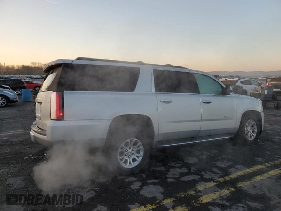2016 GMC Yukon XL SLE with VIN 1GKS2FKC0GR167871, listed as a Copart auction lot 85446244 with 137,138 mi miles and Salvage Title. Bid and sale history available at DreamBid. Image 3.
