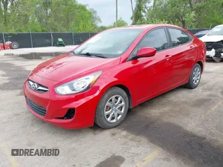 2014 Hyundai Accent GLS with VIN KMHCT4AEXEU600395, listed as a IAAI auction lot 42141052 with 172,284 mi miles. Bid and sale history available at carsss.com. Image 2.