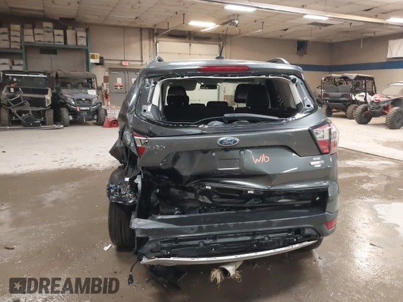 2017 Ford Escape SE with VIN 1FMCU9G9XHUB71008, listed as a IAAI auction lot 40909330 with 181,480 mi miles. Bid and sale history available at carsss.com. Image 6.