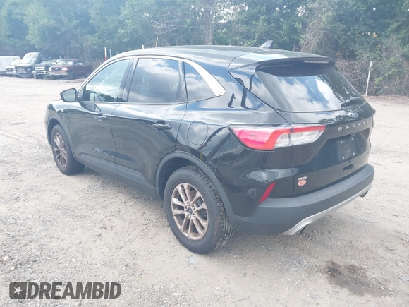 2021 Ford Escape SE with VIN 1FMCU9G60MUA38130, listed as a IAAI auction lot 42763003 with 98,388 mi miles and . Bid and sale history available at DreamBid. Image 3.