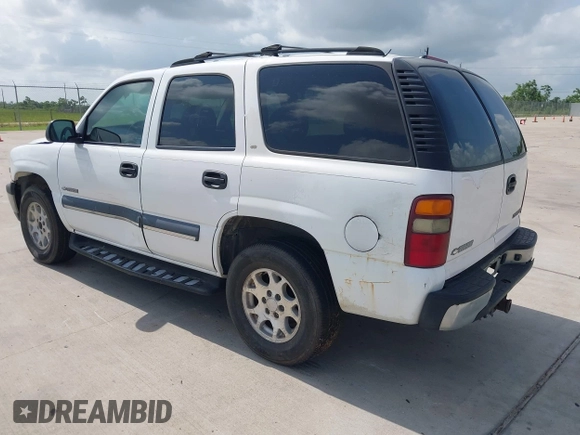 2002 Chevrolet Tahoe LS z VIN 1GNEC13Z42R214489, wystawiony jako IAAI lot #42438810 z przebiegiem 243 161 mil mil oraz . Historia ofert i sprzedaży dostępna na DreamBid. Obrazek 3.
