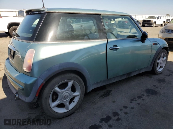 2002 MINI Hardtop with VIN WMWRC33422TE13196, listed as a Copart auction lot 59277643 with 80,501 mi miles and Non Repairable. Bid and sale history available at DreamBid. Image 3.