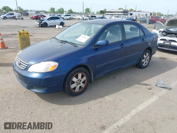 2004 Toyota Corolla CE with VIN JTDBR38E042034109, listed as a IAAI auction lot 42054614 with 162,116 mi miles. Bid and sale history available at carsss.com. Image 2.