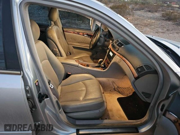 2003 Mercedes-Benz E-Class 5.0L with VIN WDBUF70J83A252853, listed as a Copart auction lot 77914304 with 181,702 mi miles and Clean Title. Bid and sale history available at carsss.com. Image 5.