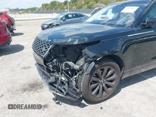 2019 Land Rover Range Rover Velar S z VIN SALYB2EX7KA210115, wystawiony jako IAAI lot #42074813 z przebiegiem 34 647 mil mil oraz . Historia ofert i sprzedaży dostępna na DreamBid. Obrazek 6.