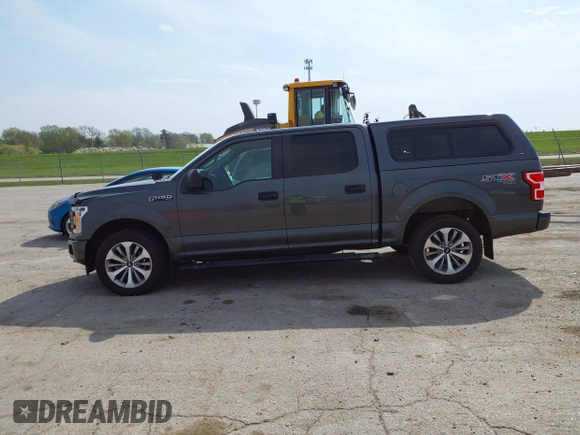 2018 Ford F-150 XL with VIN 1FTEW1EP9JKF56149, listed as a IAAI auction lot 42066727 with 73,689 mi miles and . Bid and sale history available at DreamBid. Image 14.