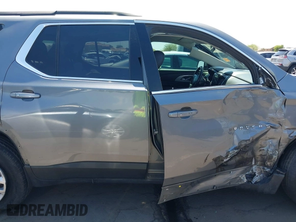 2019 Chevrolet Traverse LT Cloth with VIN 1GNERGKW3KJ150260, listed as a IAAI auction lot 42630621 with 121,244 mi miles and . Bid and sale history available at DreamBid. Image 13.