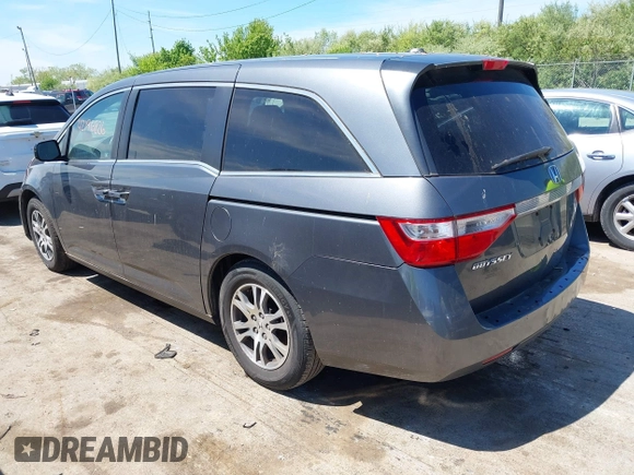 2011 Honda Odyssey EX-L with VIN 5FNRL5H62BB071404, listed as a IAAI auction lot 42196826 with 278,657 mi miles and . Bid and sale history available at carsss.com. Image 3.