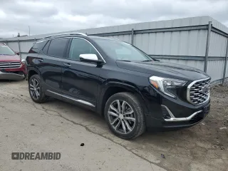 2019 GMC Terrain Denali z VIN 3GKALXEX7KL192392, wystawiony jako Copart lot #50947025 z przebiegiem 53 110 mil mil oraz Szkoda całkowita • Salvage title. Historia ofert i sprzedaży dostępna na DreamBid. Obrazek 4.
