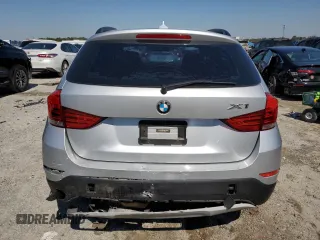 2015 BMW X1 sDrive28i with VIN WBAVM1C51FVZ94111, listed as a Copart auction lot 46981235 with 105,432 mi miles and Salvage Title. Bid and sale history available at carsss.com. Image 6.