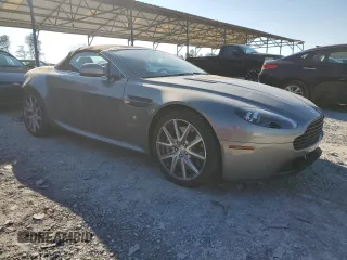 2014 Aston Martin Vantage z VIN SCFEKBBK3EGD18661, wystawiony jako Copart lot #86366204 z przebiegiem 14 863 mil mil oraz Szkoda całkowita • Salvage title. Historia ofert i sprzedaży dostępna na DreamBid. Obrazek 4.