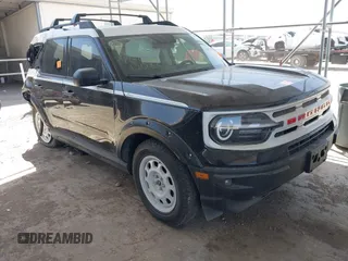 2023 Ford Bronco Sport Heritage z VIN 3FMCR9G65PRD08238, wystawiony jako IAAI lot #41707916 z przebiegiem 28 872 mil mil oraz . Historia ofert i sprzedaży dostępna na DreamBid. Obrazek 1.