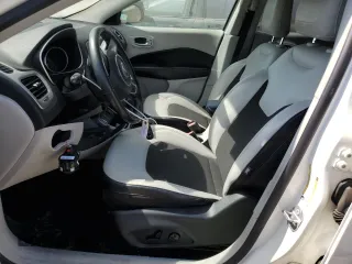 2018 Jeep Compass Latitude with VIN 3C4NJCBB7JT233848, listed as a Copart auction lot 56502715 with 94,665 mi miles and Salvage title. Bid and sale history available at DreamBid. Image 7.