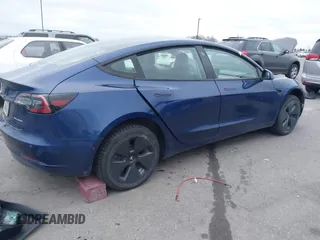 2021 Tesla Model 3 Long Range with VIN 5YJ3E1EB8MF848049, listed as a IAAI auction lot 40974331 with 61,462 mi miles. Bid and sale history available at carsss.com. Image 4.