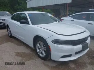 2023 Dodge Charger SXT with VIN 2C3CDXBG2PH530257, listed as a IAAI auction lot 42067908 with 56,294 mi miles. Bid and sale history available at carsss.com. Image 1.