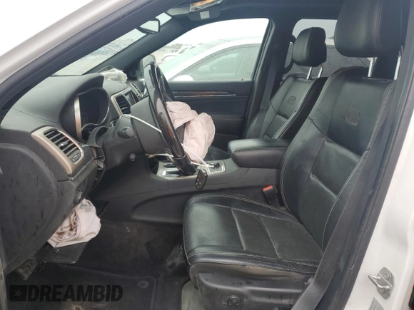 2017 Jeep Grand Cherokee Overland with VIN 1C4RJFCGXHC823593, listed as a Copart auction lot 58727205 with Not provided miles and Salvage title. Bid and sale history available at DreamBid. Image 7.