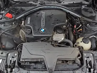2014 BMW 3 Series 328i with VIN WBA3A5C57EJ463542, listed as a Copart auction lot 69963795 with 171,751 mi miles and Clean title. Bid and sale history available at DreamBid. Image 14.