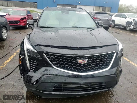 2022 Cadillac XT4 AWD Sport с VIN 1GYFZFR46NF170841, выставлен на аукционе Copart как лот 55863705 с пробегом 14 745 миль миль и Списание • Salvage title. История ставок и продаж доступна на DreamBid. Изображение 14.