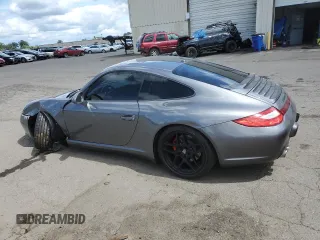 2009 Porsche 911 Carrera S z VIN WP0AB29929S720512, wystawiony jako Copart lot #56697685 z przebiegiem 36 676 mil mil oraz Szkoda całkowita • Salvage title. Historia ofert i sprzedaży dostępna na DreamBid. Obrazek 2.