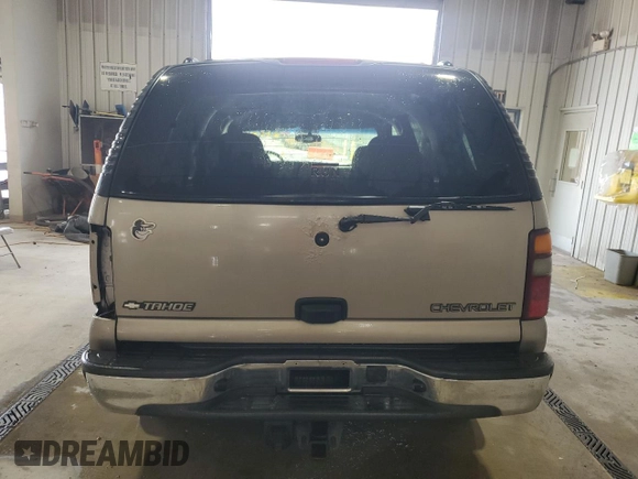 2002 Chevrolet Tahoe LS z VIN 1GNEC13Z82J278601, wystawiony jako Copart lot #59963545 z przebiegiem 149 999 mil mil oraz Szkoda całkowita • Salvage title. Historia ofert i sprzedaży dostępna na DreamBid. Obrazek 6.