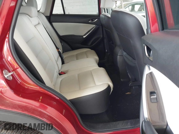 2016 Mazda CX-5 Grand Touring with VIN JM3KE4DY3G0688062, listed as a IAAI auction lot 42025169 with 59,867 mi miles and . Bid and sale history available at carsss.com. Image 8.