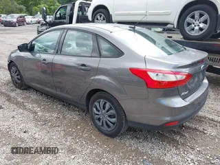 2012 Ford Focus SE with VIN 1FAHP3F29CL310052, listed as a IAAI auction lot 42671578 with 220,537 mi miles and . Bid and sale history available at DreamBid. Image 3.