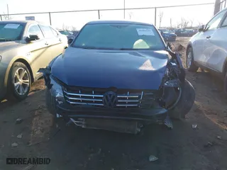 2015 Volkswagen Passat 2.0L TDI SE w/Sunroof with VIN 1VWBV7A34FC021031, listed as a IAAI auction lot 41601548 with 173,402 mi miles. Bid and sale history available at carsss.com. Image 12.