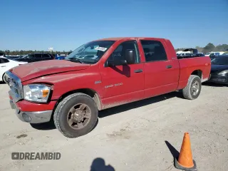 2006 Dodge 1500 SLT with VIN 3D7KR19D06G235986, listed as a Copart auction lot 89410385 with 214,406 mi miles and Salvage Title. Bid and sale history available at DreamBid. Image 1.