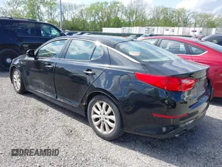 2014 Kia Optima EX z VIN 5XXGN4A71EG340220, wystawiony jako IAAI lot #42176989 z przebiegiem 177 064 mil mil oraz . Historia ofert i sprzedaży dostępna na DreamBid. Obrazek 3.
