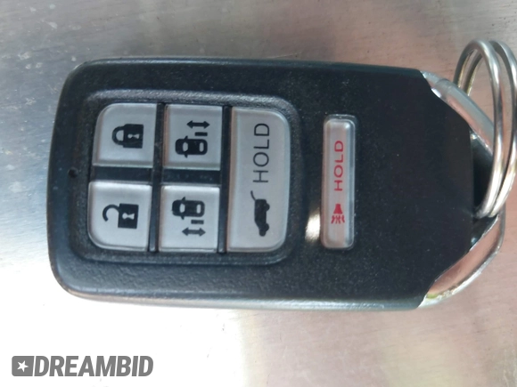 2015 Honda Odyssey EX-L with VIN 5FNRL5H6XFB123366, listed as a IAAI auction lot 42037807 with 141,135 mi miles and . Bid and sale history available at DreamBid. Image 11.