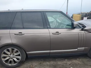 2015 Land Rover Range Rover HSE z VIN SALGS2VF4FA220237, wystawiony jako IAAI lot #41087301 z przebiegiem 110 309 mil mil oraz . Historia ofert i sprzedaży dostępna na DreamBid. Obrazek 14.