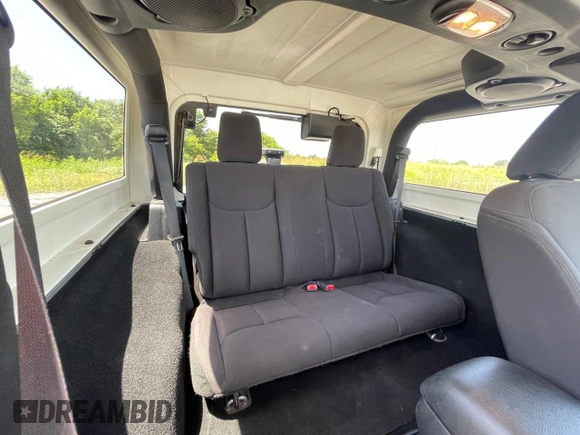 2014 Jeep Wrangler Sport with VIN 1C4AJWAG8EL147947, listed as a Copart auction lot 65750955 with 122,841 mi miles and Clean title. Bid and sale history available at DreamBid. Image 6.