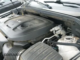 2018 Jeep Grand Cherokee Sterling with VIN 1C4RJFBG7JC263183, listed as a IAAI auction lot 41801205 with 104,301 mi miles and . Bid and sale history available at DreamBid. Image 19.