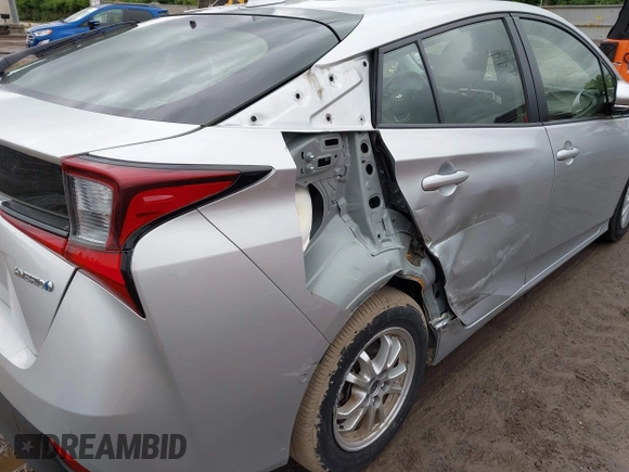 2019 Toyota Prius L Eco z VIN JTDKARFU2K3096560, wystawiony jako IAAI lot #42322950 z przebiegiem 20 866 mil mil oraz . Historia ofert i sprzedaży dostępna na DreamBid. Obrazek 6.