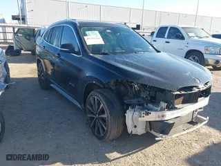 2018 BMW X1 sDrive28i with VIN WBXHU7C30J5L04913, listed as a IAAI auction lot 41755344 with 101,867 mi miles. Bid and sale history available at carsss.com. Image 1.