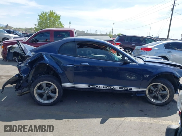 2002 Ford Mustang GT Deluxe z VIN 1FAFP42X12F191957, wystawiony jako IAAI lot #42021857 z przebiegiem Nie podano mil oraz . Historia ofert i sprzedaży dostępna na DreamBid. Obrazek 13.
