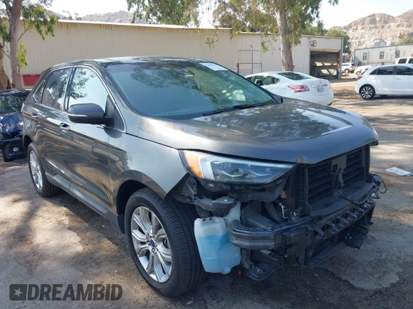 2020 Ford Edge Titanium with VIN 2FMPK3K94LBB10568, listed as a IAAI auction lot 42430196 with 76,490 mi miles and . Bid and sale history available at DreamBid. Image 1.