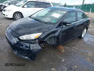 2016 Ford Focus Titanium z VIN 1FADP3J27GL215436, wystawiony jako IAAI lot #42709166 z przebiegiem 75 956 mil mil oraz . Historia ofert i sprzedaży dostępna na DreamBid. Obrazek 18.
