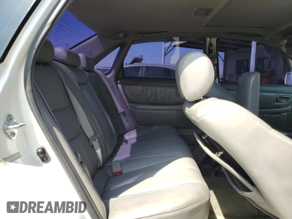 2000 Toyota Avalon XL with VIN 4T1BF28B9YU068001, listed as a Copart auction lot 54958915 with 240,232 mi miles and Salvage Title. Bid and sale history available at DreamBid. Image 10.