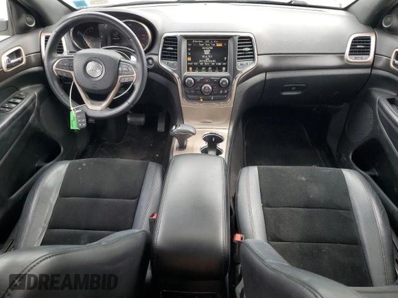 2014 Jeep Grand Cherokee Altitude with VIN 1C4RJFAG4EC570883, listed as a Copart auction lot 51631785 with 111,300 mi miles and Salvage Title. Bid and sale history available at carsss.com. Image 8.