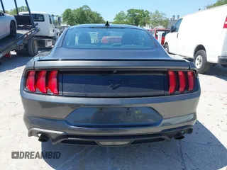 2020 Ford Mustang EcoBoost z VIN 1FA6P8TH1L5183279, wystawiony jako IAAI lot #41904731 z przebiegiem 99 222 mil mil oraz . Historia ofert i sprzedaży dostępna na DreamBid. Obrazek 17.