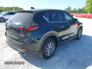 2023 Mazda CX-5 S Preferred with VIN JM3KFBCM7P0188244, listed as a IAAI auction lot 41969630 with 51,058 mi miles and . Bid and sale history available at carsss.com. Image 4.