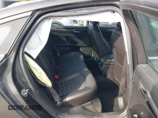 2015 Ford Fusion SE Hybrid with VIN 3FA6P0LUXFR266743, listed as a IAAI auction lot 40862039 with 116,610 mi miles. Bid and sale history available at carsss.com. Image 8.