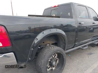 2017 Ram 2500 SLT with VIN 3C6UR5DL1HG759215, listed as a IAAI auction lot 41457317 with 114,939 mi miles and . Bid and sale history available at DreamBid. Image 6.
