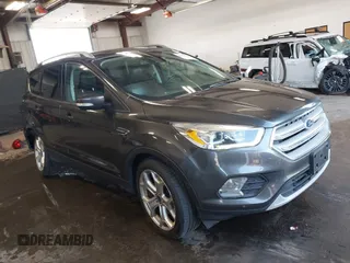 2019 Ford Escape Titanium with VIN 1FMCU9J97KUC55772, listed as a IAAI auction lot 42514001 with 77,737 mi miles and . Bid and sale history available at DreamBid. Image 1.