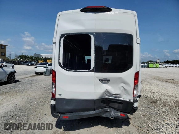 2021 Ford Transit Cargo with VIN 1FTBR3X83MKA58920, listed as a Copart auction lot 59946095 with 65,655 mi miles and Salvage title. Bid and sale history available at DreamBid. Image 6.